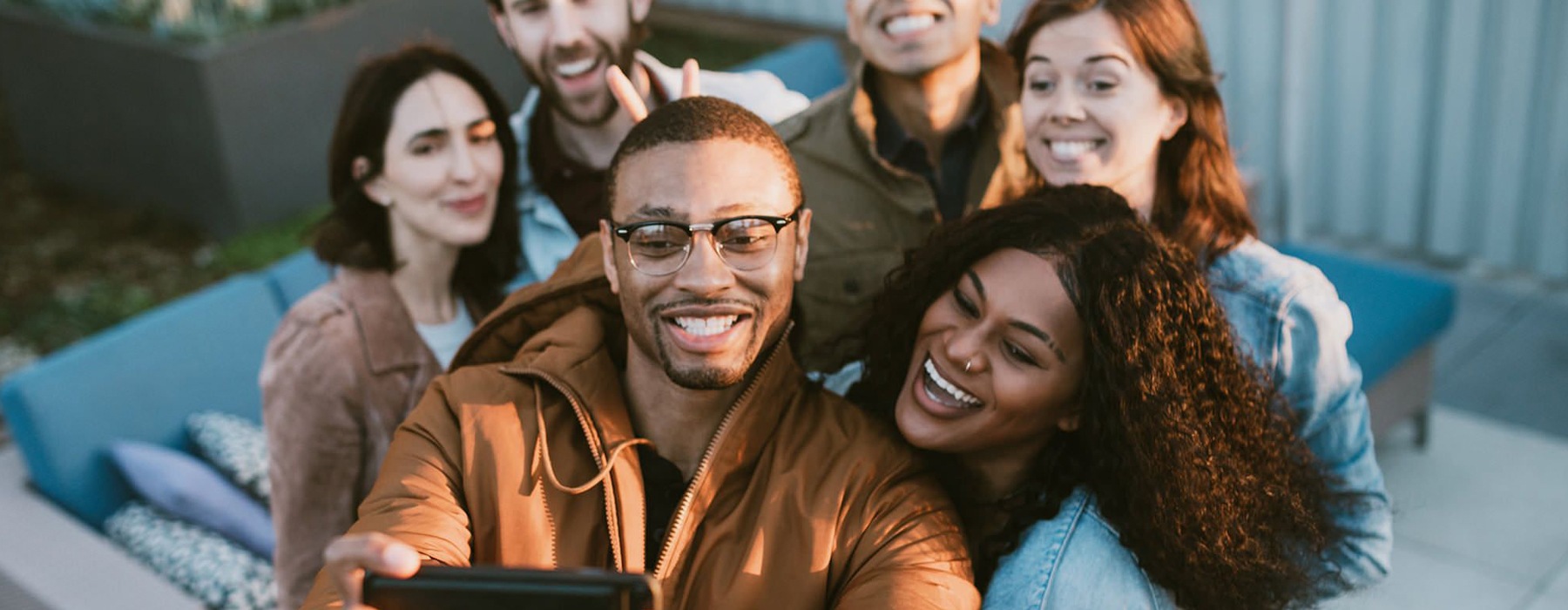 Friends taking group selfie outdoors in Cherokee County, GA